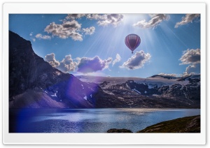 Hot Air Balloon Over Mountains