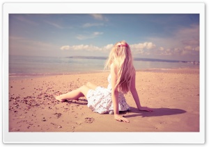 Blonde Girl On The Beach