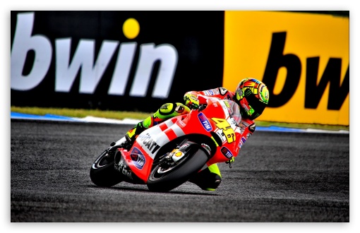 Download Valentino Rossi On Ducati Motorcycle UltraHD Wallpaper