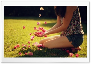 Girl Playing With Flowers