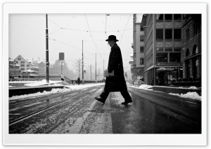 A Man Crossing The Street