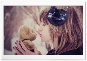 Girl Kissing Teddy Bear