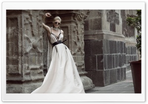 Fashion Model in White Dress...