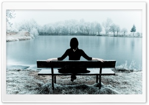 Woman Sitting Alone On A Bench