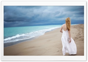 Blonde Woman On The Beach