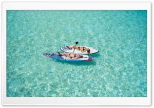 Girls Sunbathing on Surfboards