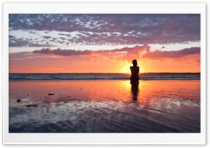 Woman Watching The Sunset