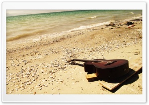 Guitar On The Beach