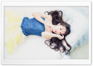 Girl in Bed in Snow White Dress