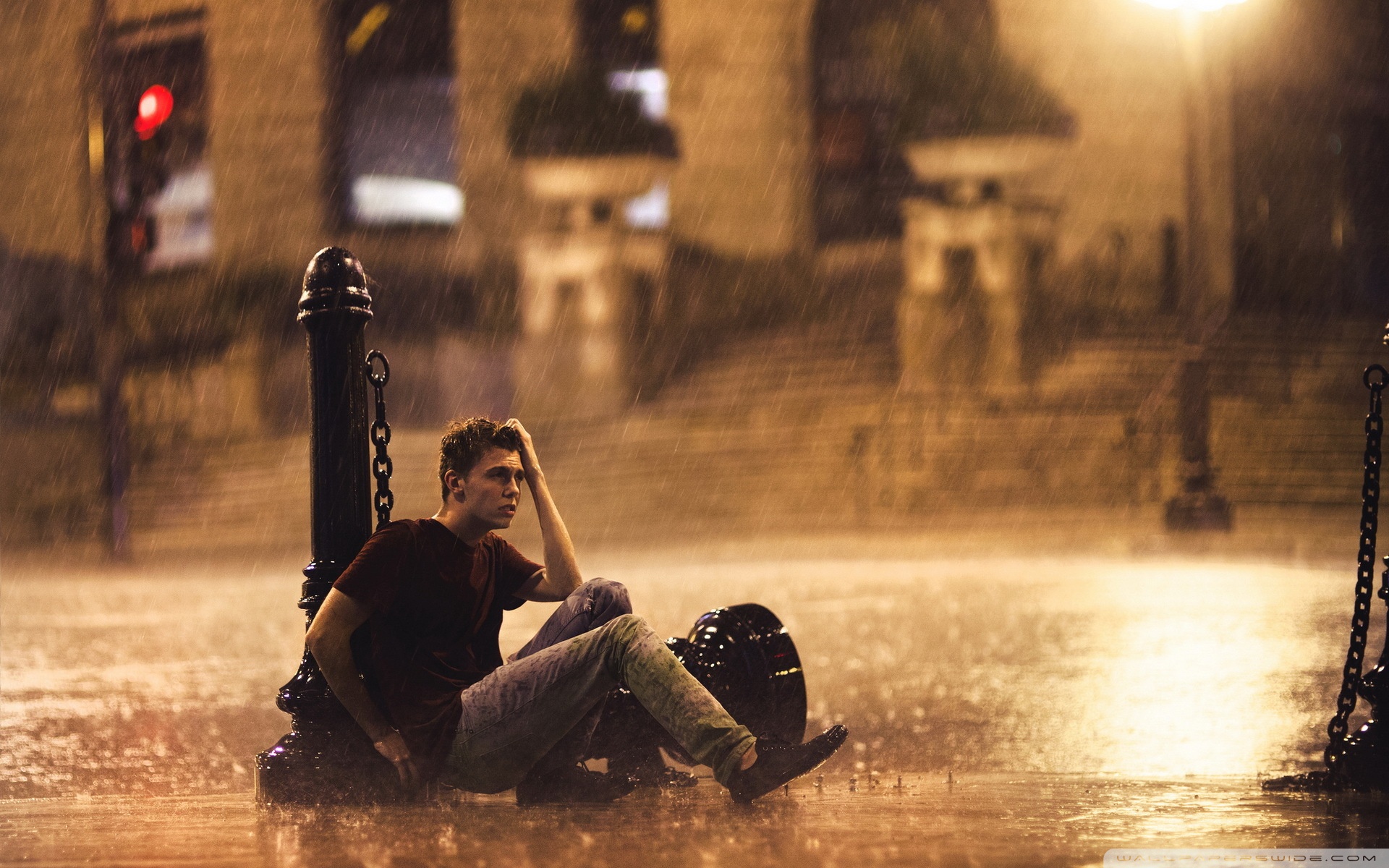 Download Man Standing in the Rain UltraHD Free Wallpaper.